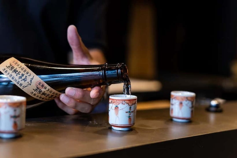 Ginza, Tokyo: Sake Experience with traditional vessels - Learning from the English-speaking staff