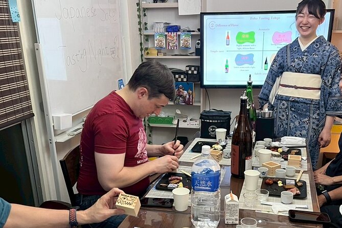 Japanese Sake Tasting and Masu Crafting Experience in Tokyo - Decorating your own wooden masu cup