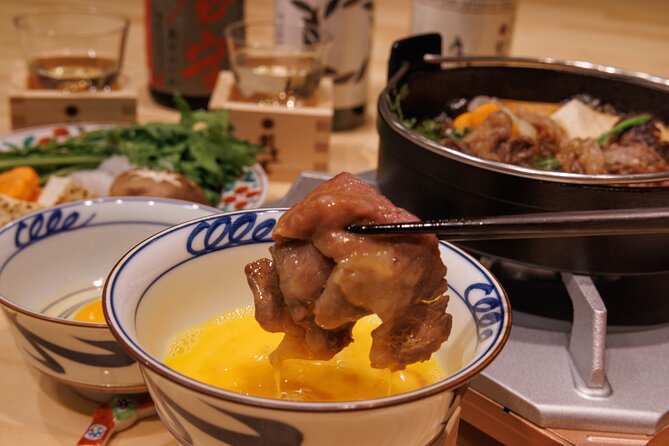 Japanese Sake Tasting & Wagyu Sukiyaki Cooking Class in Tokyo - A vegetable-cutting demonstration with a purpose