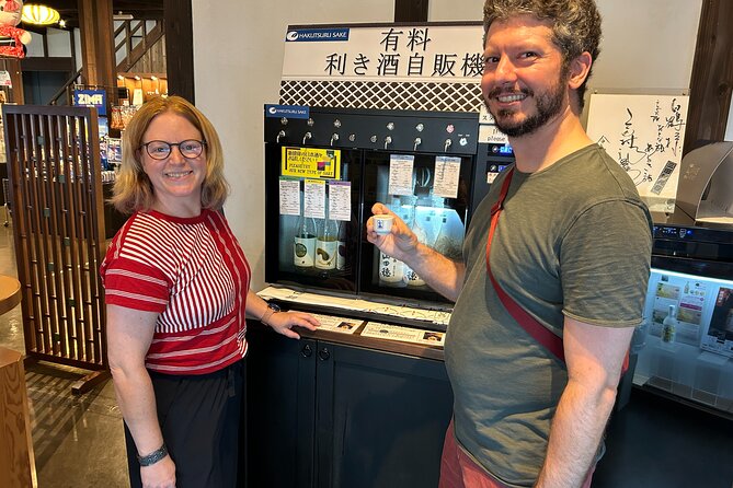 KOBE Sake brewery PRIVATE walking tour with Local guide - The Kiku-Masamune barrel stop shows a working side of sake
