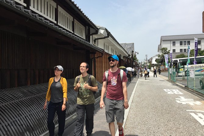 KYOTO Sake Tasting Tour at Local Breweries(tasting fee included) - A garden, food court, and sake bar