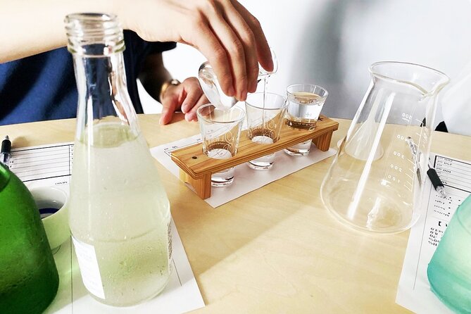 Sake Blending Experience : Craft Your Own Signature Sake - Painting a kanji label for the finished bottle