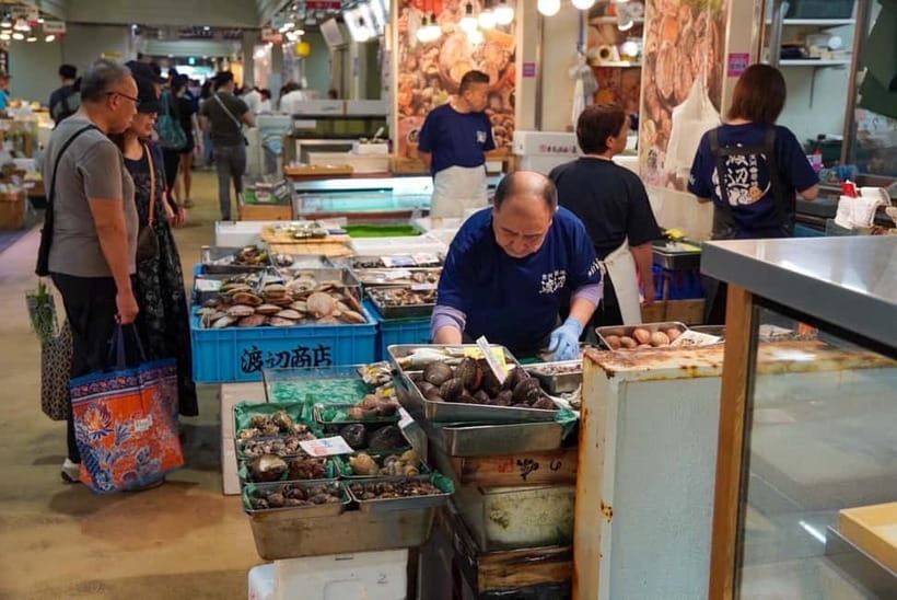 Tokyo: Private Tsukiji Street Food & Sake with Local Guide - Tea, beans, peanuts, and the taste of dashi